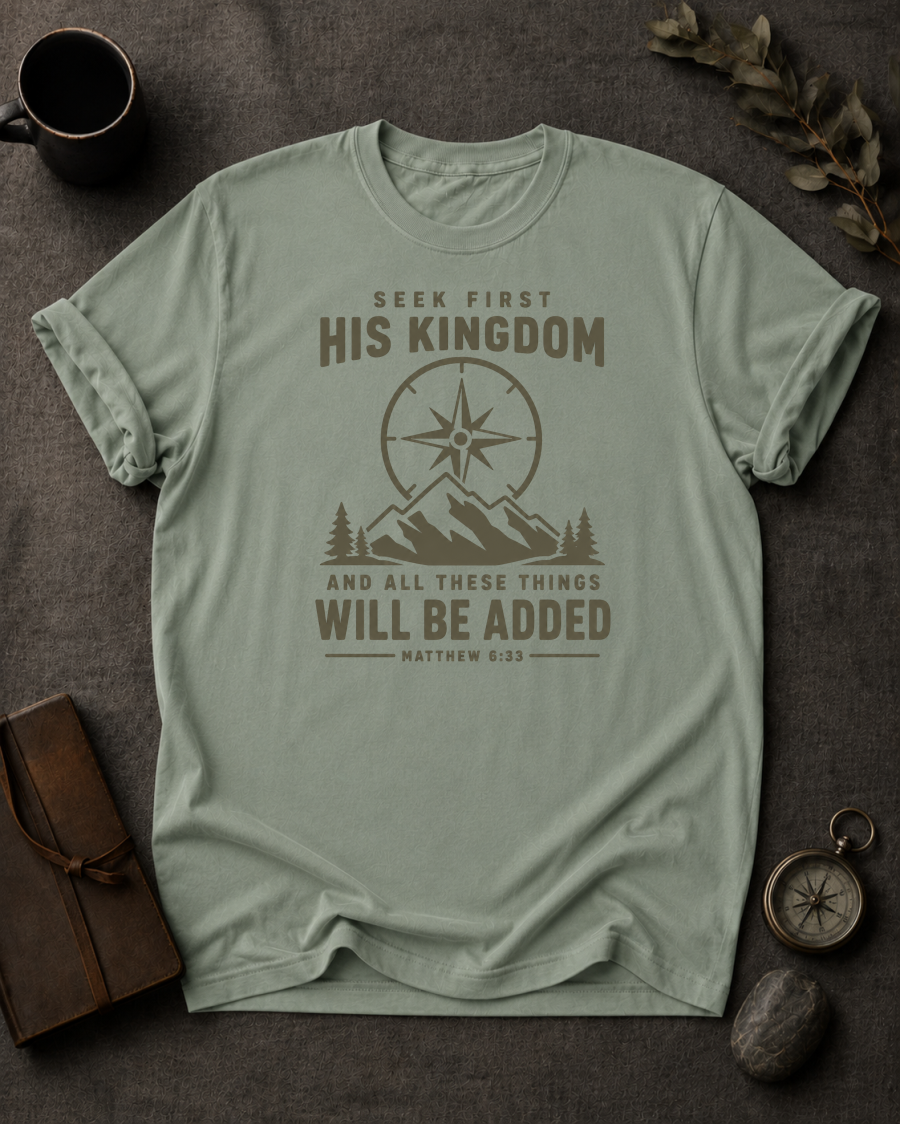 bay Comfort Colors t-shirt with compass and mountain design reading 'Seek First His Kingdom, and all these things will be added, Matthew 6:33'"