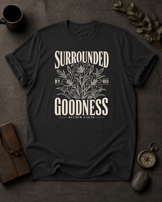Surrounded By His Goodness | Matthew 6:28-30 Christian T-Shirt