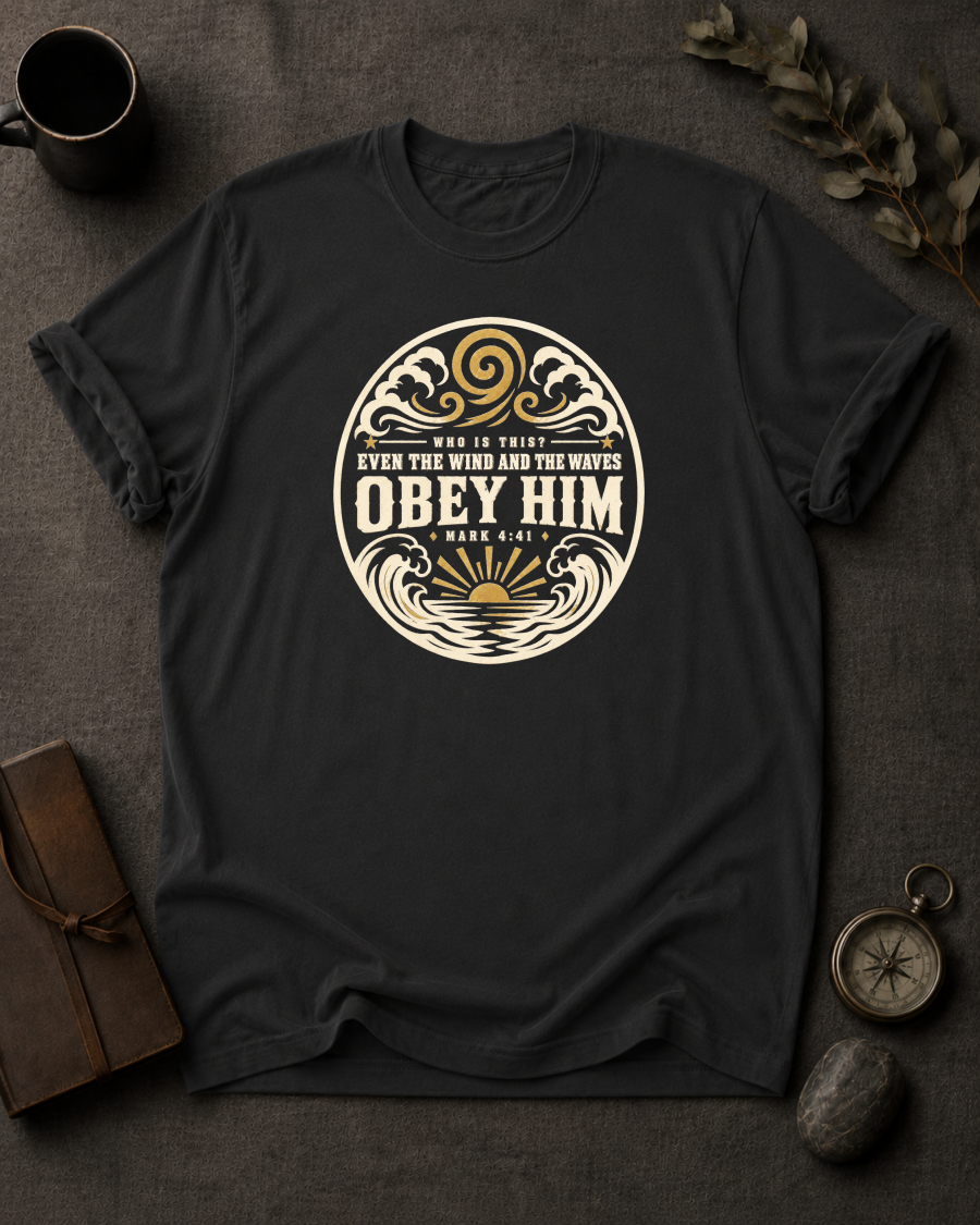 black Comfort Colors t-shirt with wave and sunrise design reading 'Who Is This? Even the Wind and the Waves Obey Him, Mark 4:41'