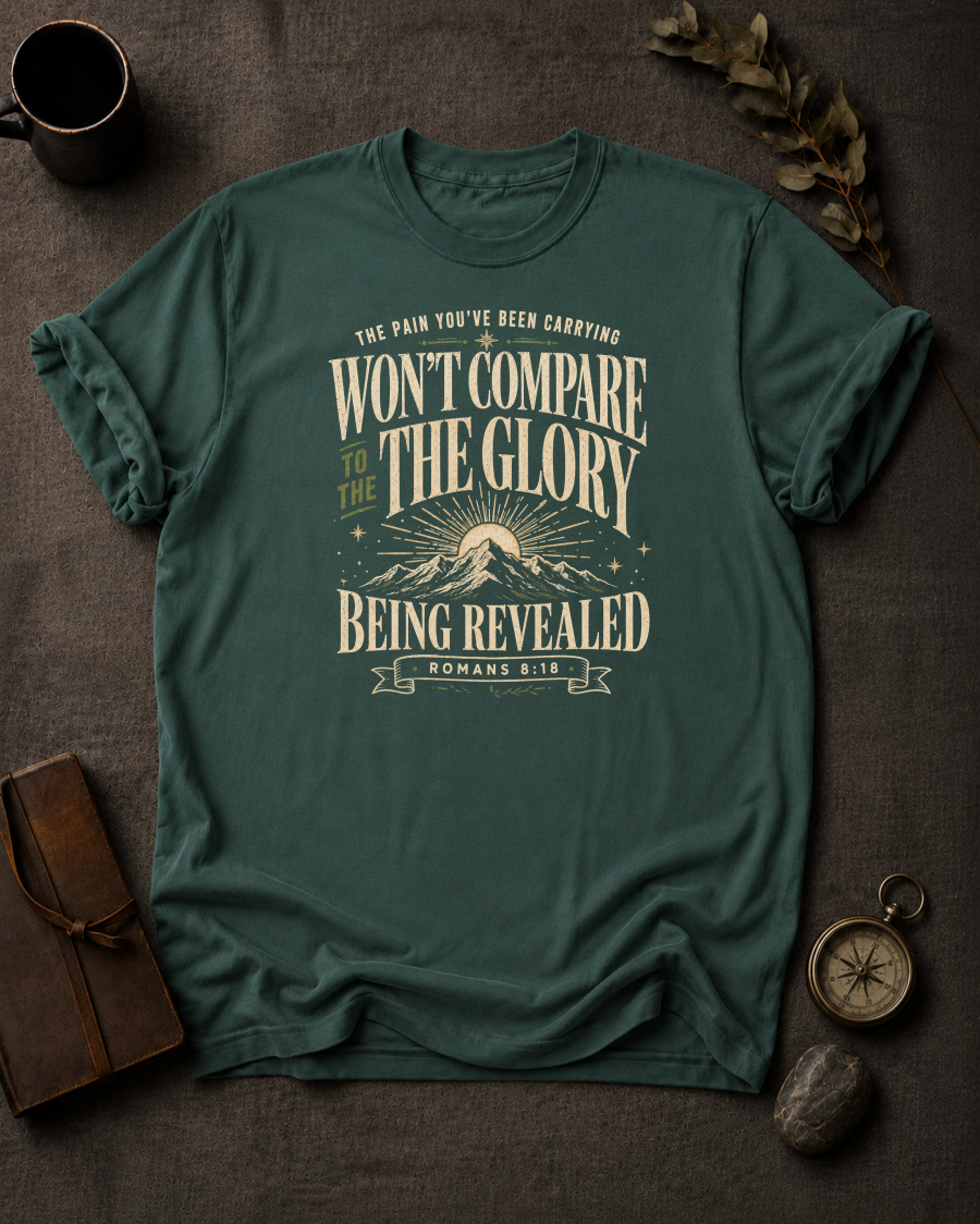 blue spruce Comfort Colors t-shirt with mountain sunrise design and Romans 8:18 — 'Won't compare to the glory being revealed