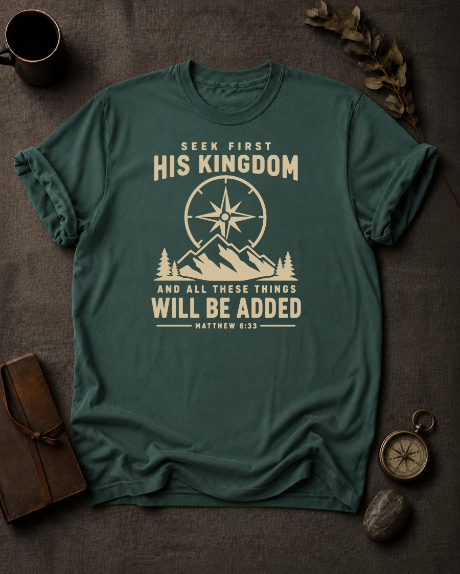 blue spruce Comfort Colors t-shirt with compass and mountain design reading 'Seek First His Kingdom, and all these things will be added, Matthew 6:33'"