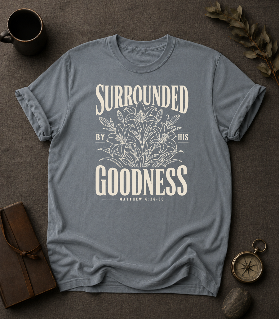 Surrounded By His Goodness | Matthew 6:28-30 Christian T-Shirt