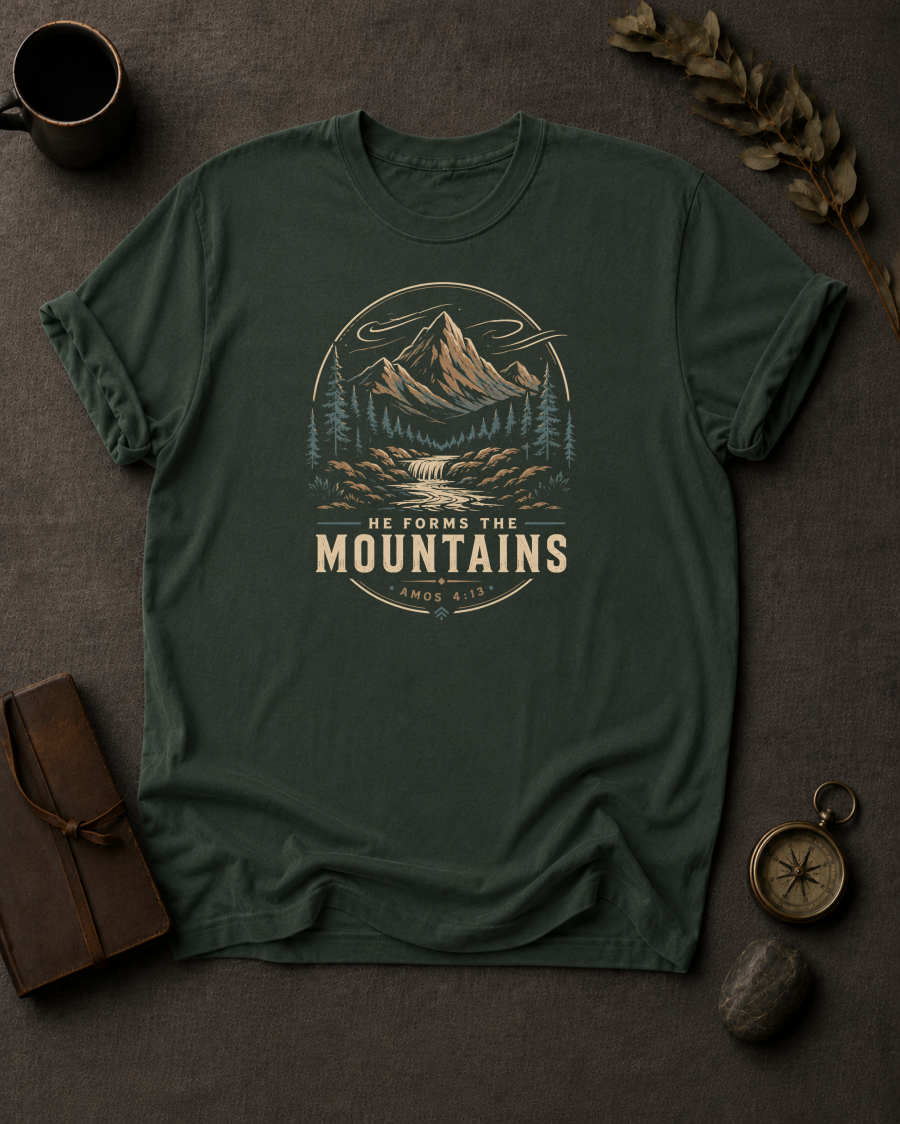 moss Comfort Colors t-shirt with mountain waterfall design and Amos 4:13 — 'He Forms the Mountains'