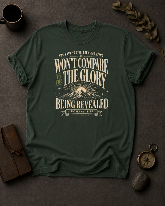 moss Comfort Colors t-shirt with mountain sunrise design and Romans 8:18 — 'Won't compare to the glory being revealed