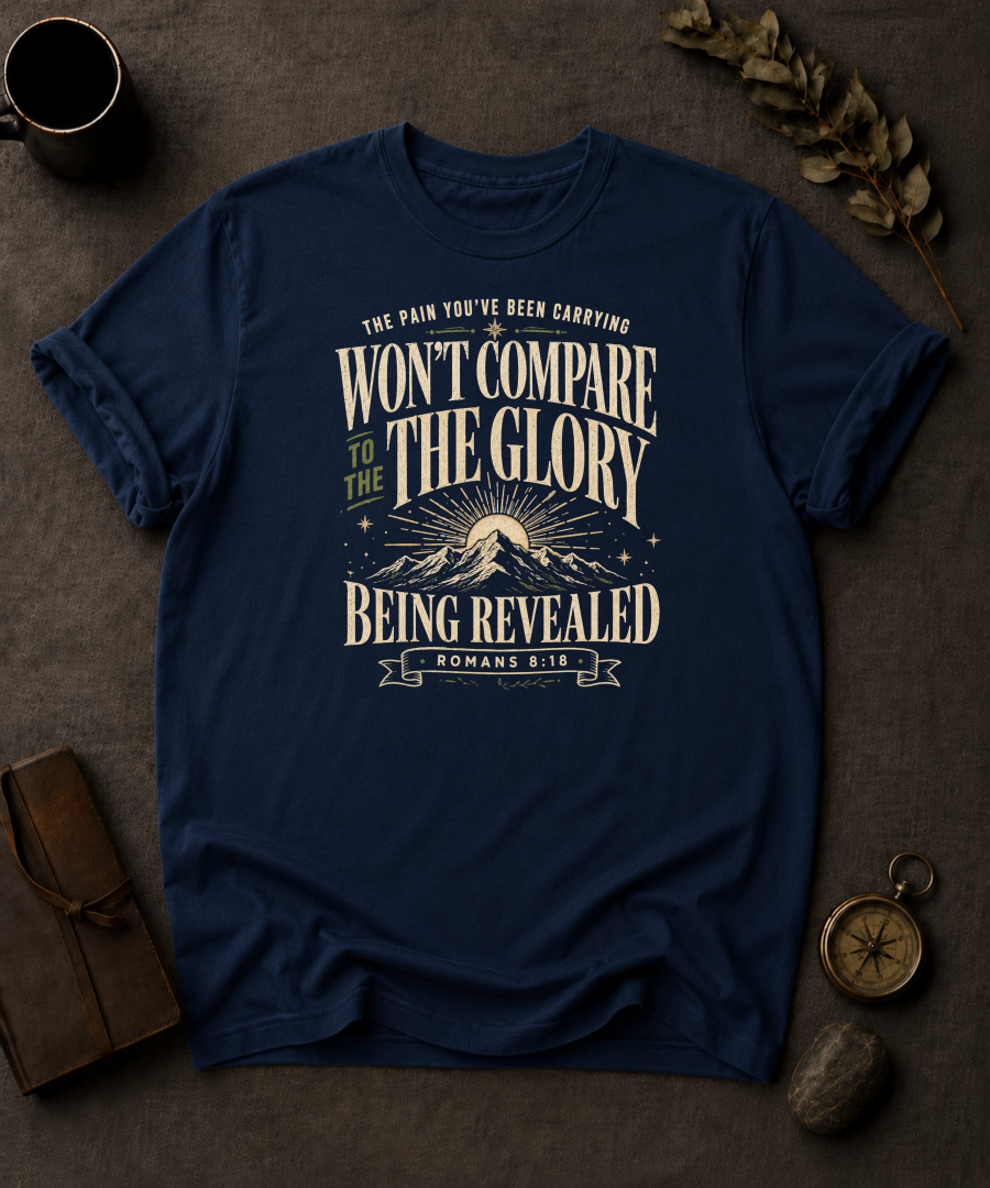 navy Comfort Colors t-shirt with mountain sunrise design and Romans 8:18 — 'Won't compare to the glory being revealed