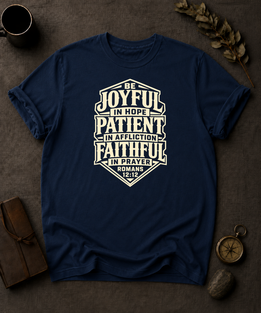 navy Comfort Colors t-shirt with vintage typography design, Romans 12:12 — 'Joyful in Hope, Patient in Affliction, Faithful in Prayer'