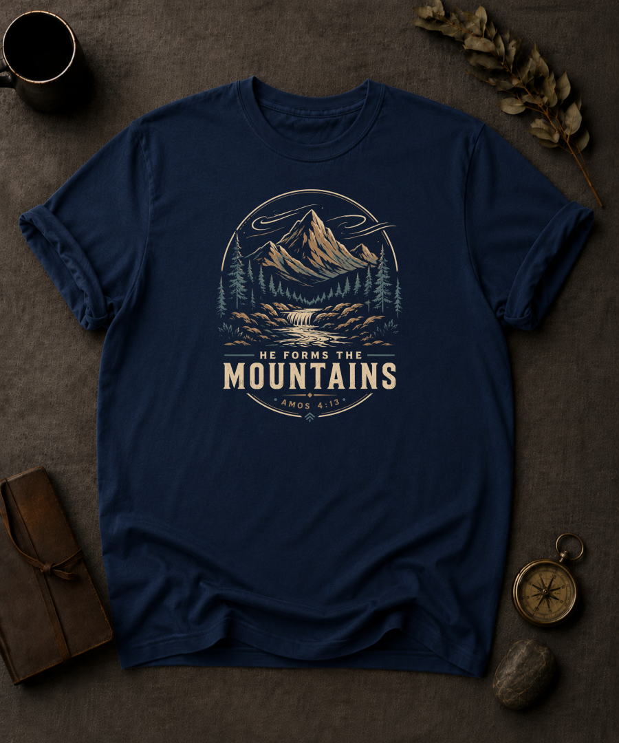 navy Comfort Colors t-shirt with mountain waterfall design and Amos 4:13 — 'He Forms the Mountains'