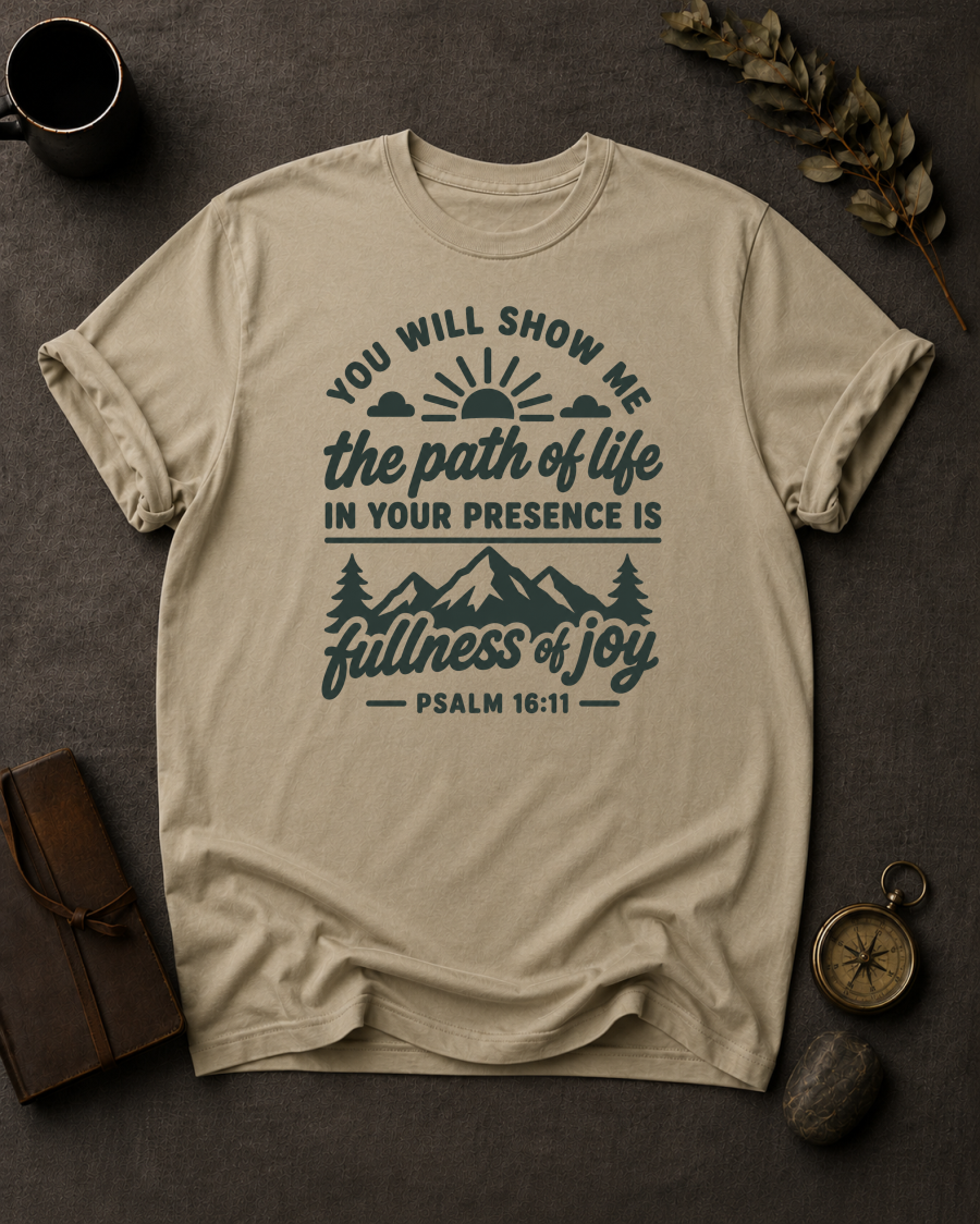 sandstone Comfort Colors t-shirt with sunrise mountain design and Psalm 16:11 — 'You will show me the path of life, fullness of joy