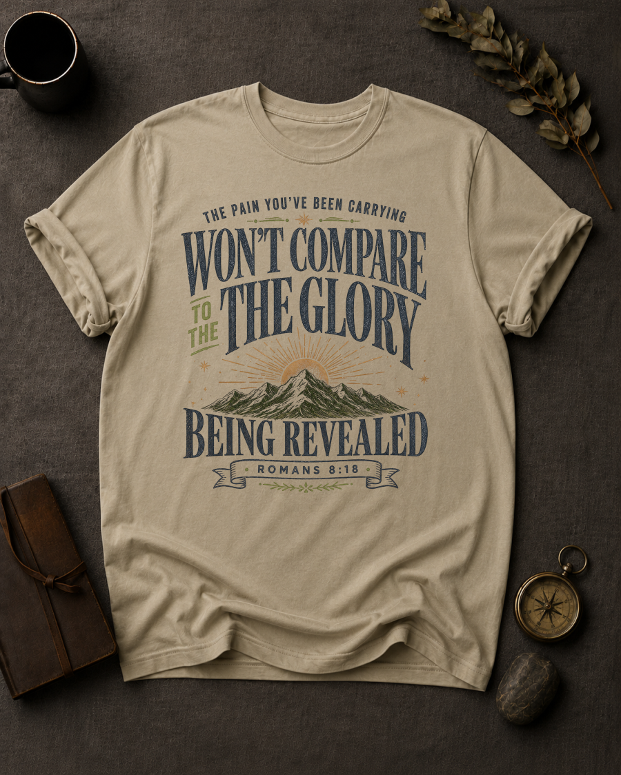 sandstone Comfort Colors t-shirt with mountain sunrise design and Romans 8:18 — 'Won't compare to the glory being revealed