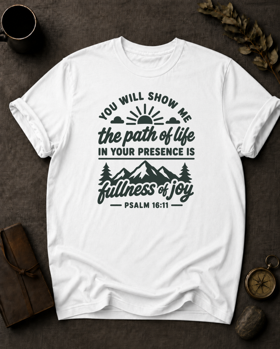white Comfort Colors t-shirt with sunrise mountain design and Psalm 16:11 — 'You will show me the path of life, fullness of joy